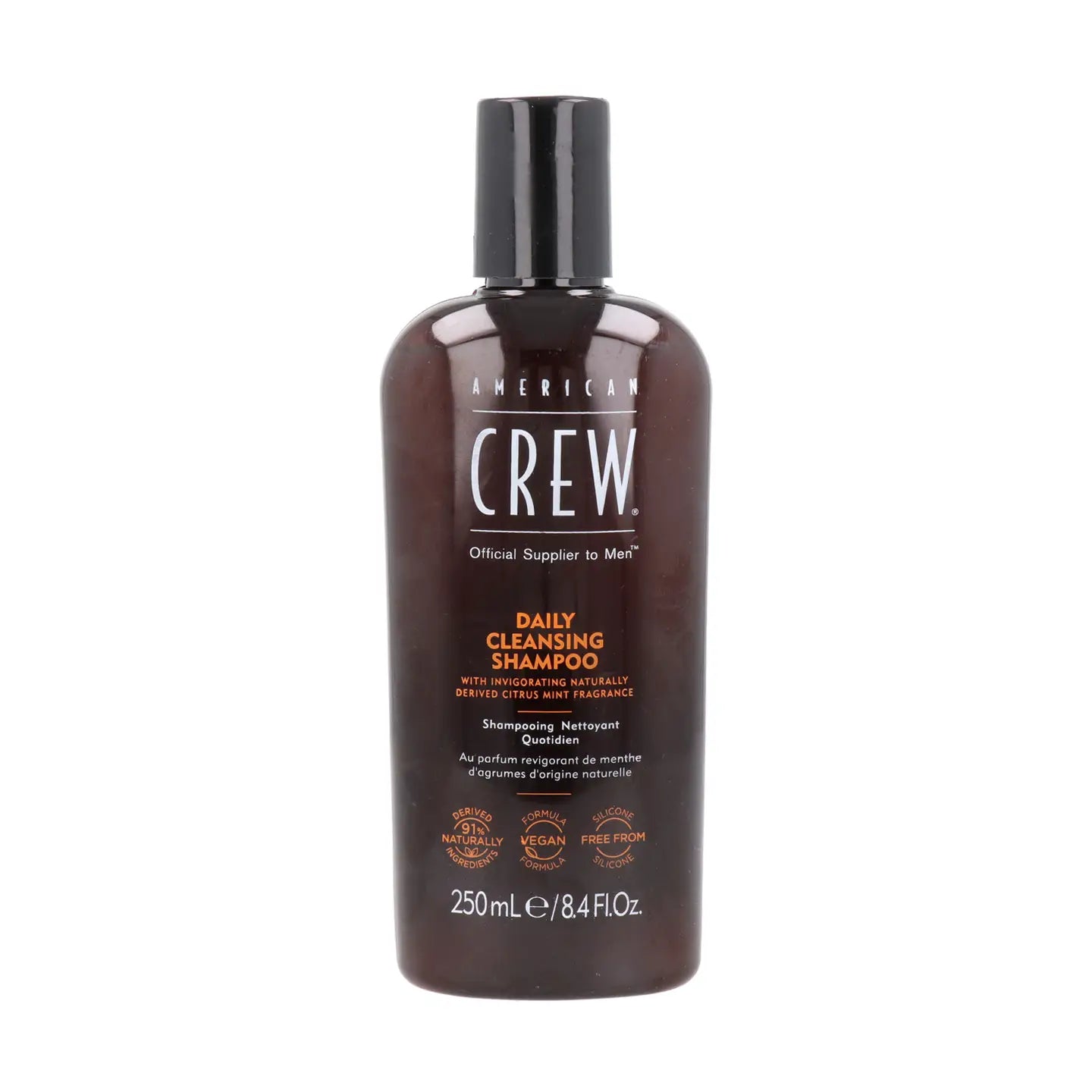 American Crew Daily Cleansing Shampoo til mænd i en klassisk 250 ml flaske.